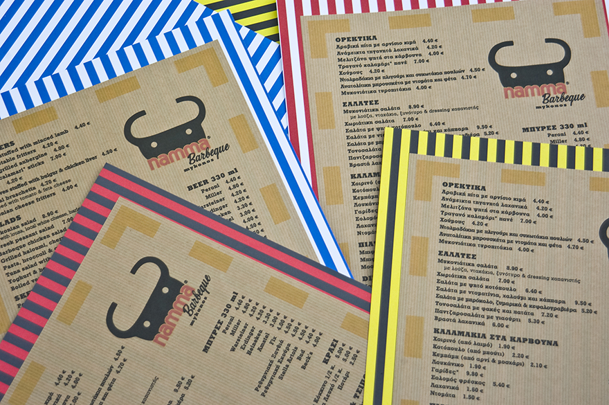 The final menu production, printed on brown craft paper, stuck on multi-colored striped card.